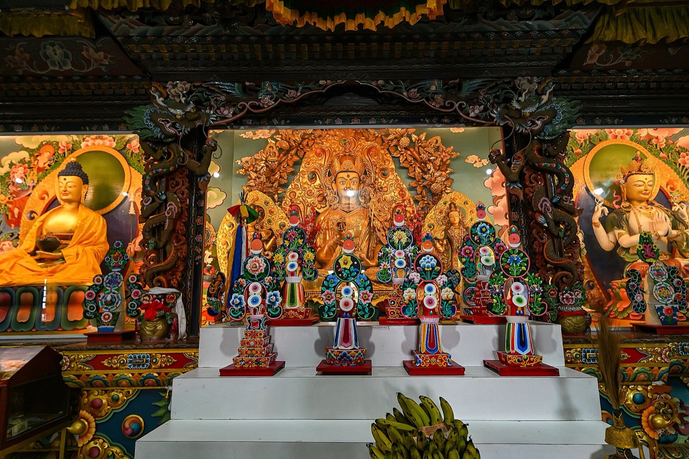 Ornate wooden interior and murals inside Pemayangtse Monastery, Pelling