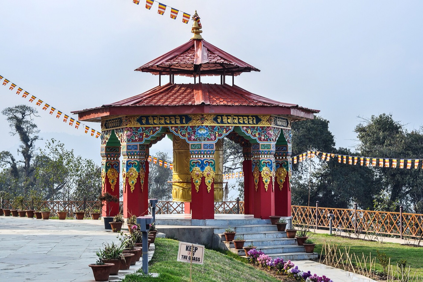Prayer wheel at the Pelling Skywalk complex near the Chenrezig statue